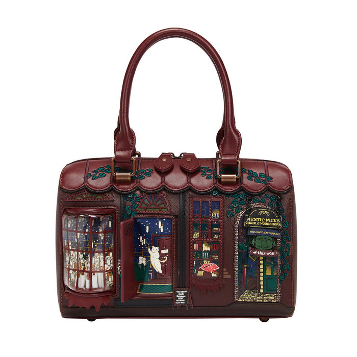 Decorative handbag with a detailed design on a white background