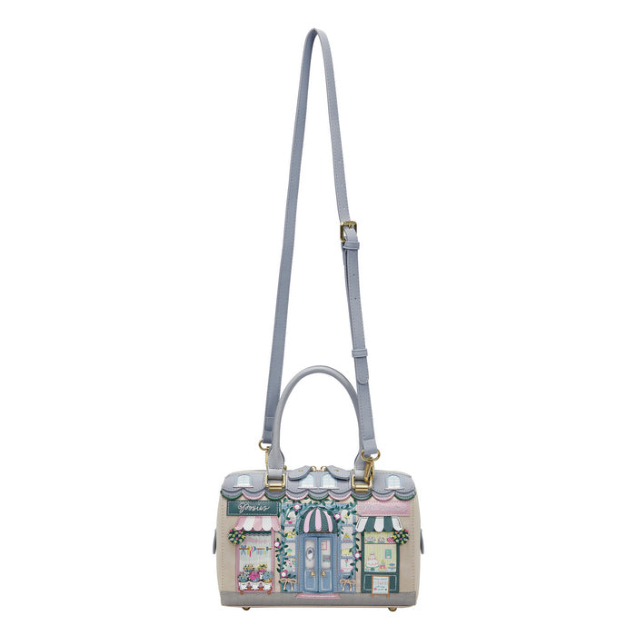 Handbag with a design of a building on a white background
