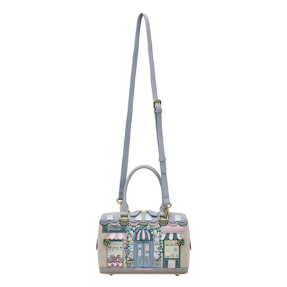 Handbag with a design of a building on a white background