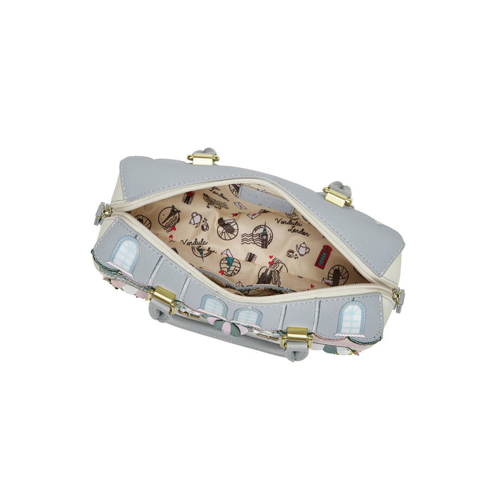 Light gray handbag with gold accents on a white background