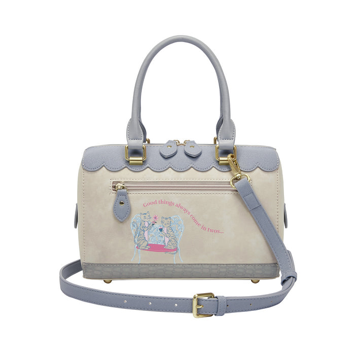 Handbag with decorative elements and text on a white background