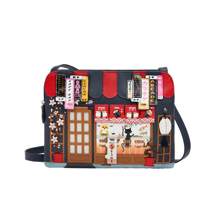 Handbag with a design of a street scene and building facades on a white background