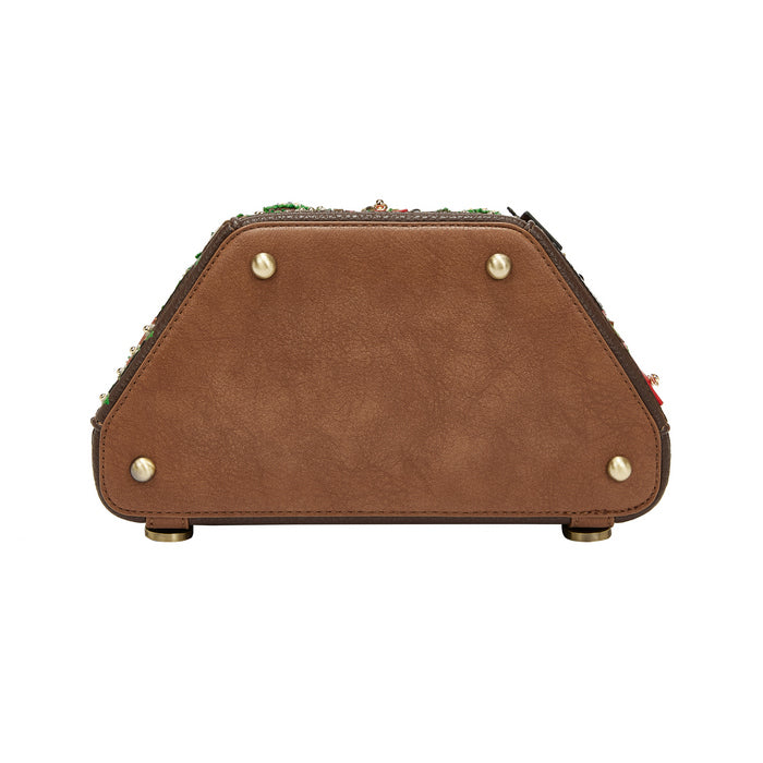 Brown leather product with gold studs on a white background