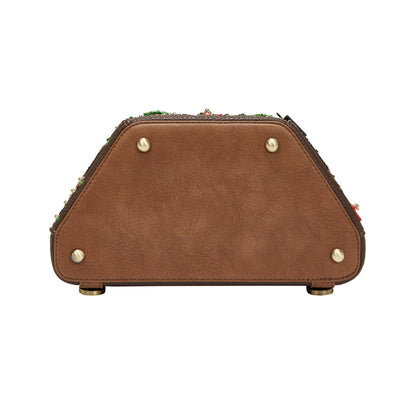 Brown leather product with gold studs on a white background