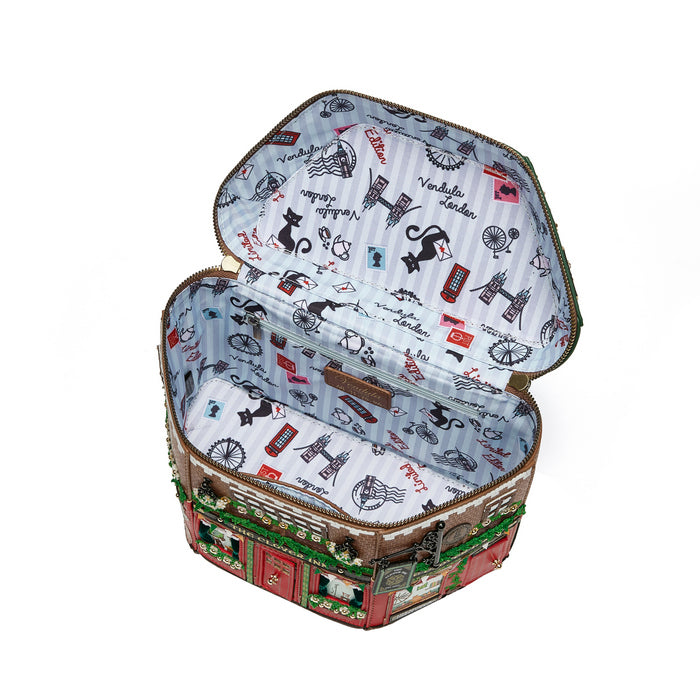 Open sewing basket with patterned interior and exterior on a white background