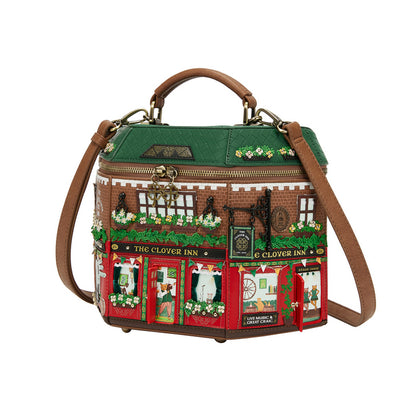 Handbag designed like a pub facade with decorative elements on a white background