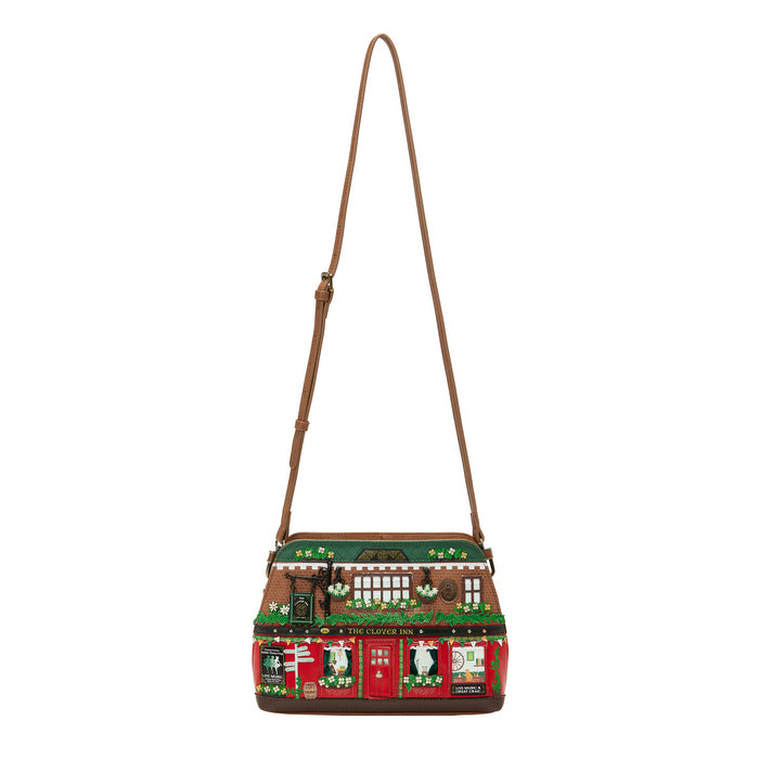 Handbag with a festive design featuring a house and teddy bear on a white background