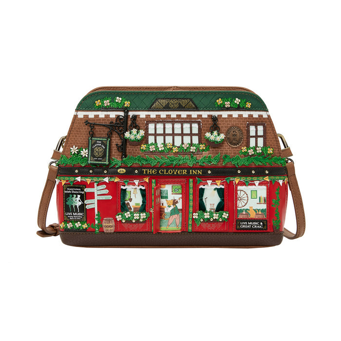 Handbag designed like 'The Clover Inn' with a festive theme on a white background