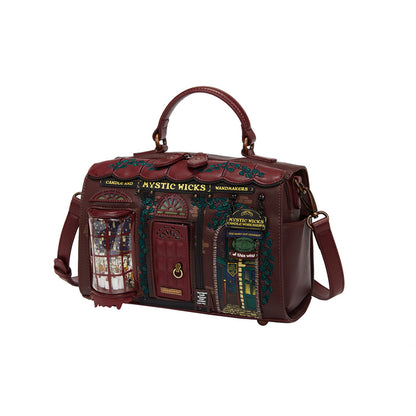 Brown leather bag with decorative elements and 'Mystic Wicks' branding on a white background