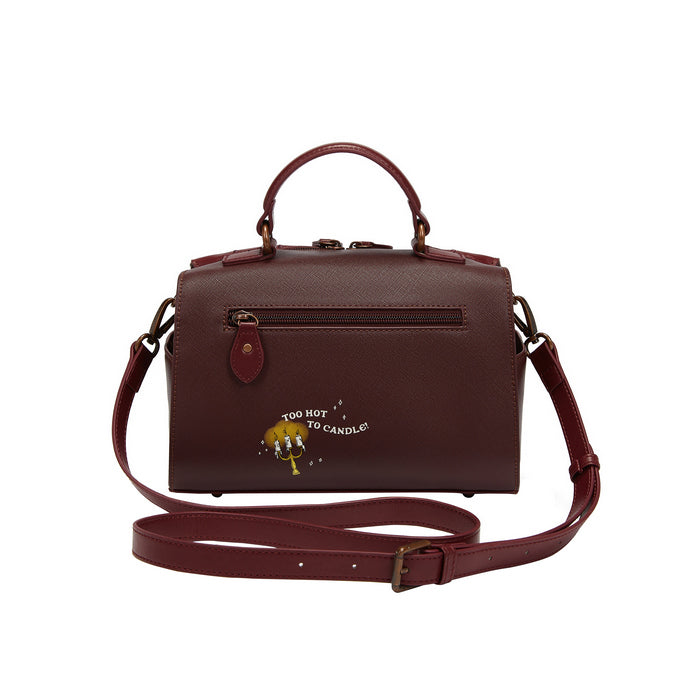 Brown handbag with a strap on a white background