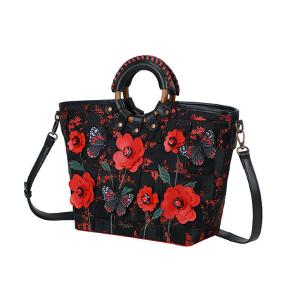 Black handbag with red floral pattern on a white background