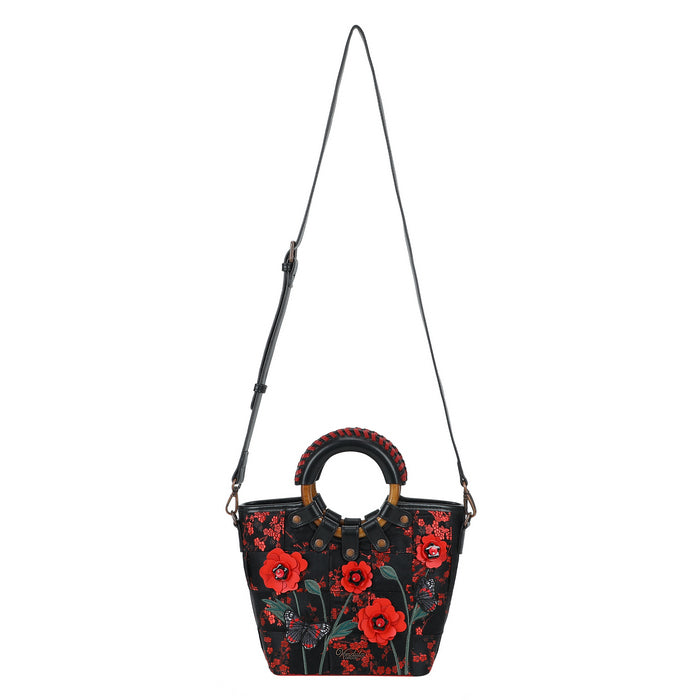 Black handbag with red floral patterns on a white background