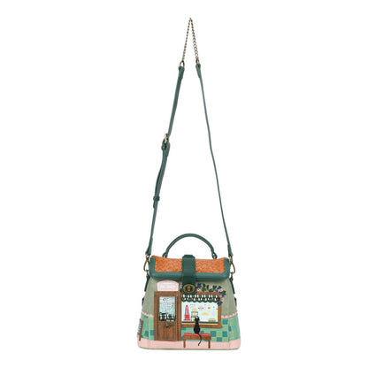 Handbag with a detailed design on a white background