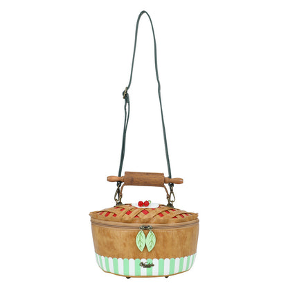 Basket-shaped handbag with a pie design on a white background