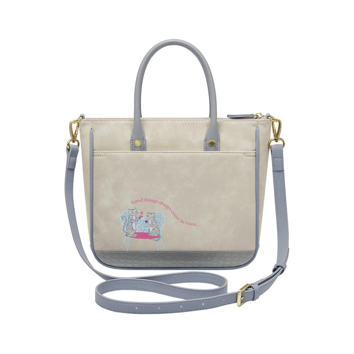 Handbag with a detailed design of a street scene on a white background