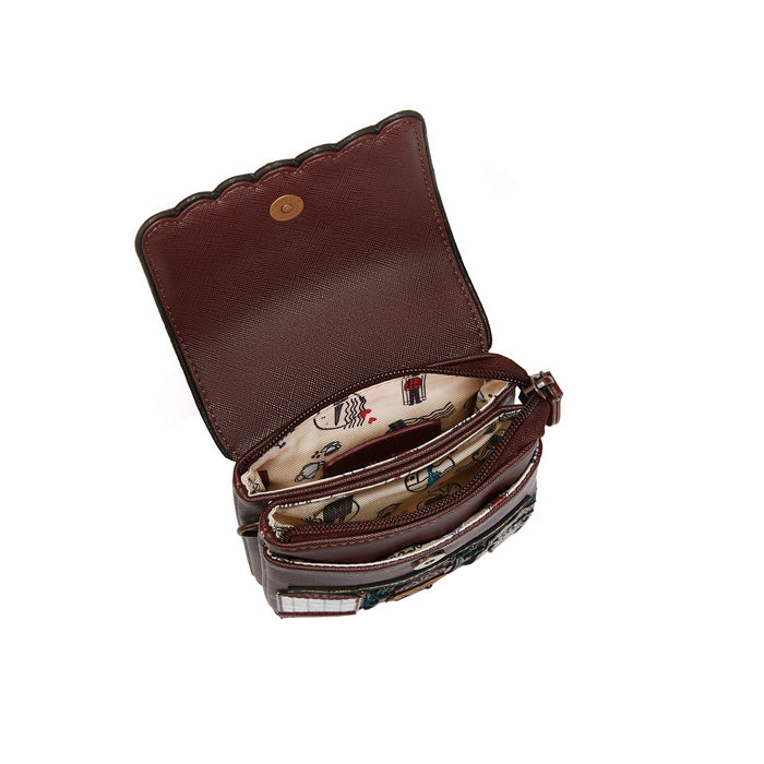 Brown leather handbag with open top showing interior lining on a white background