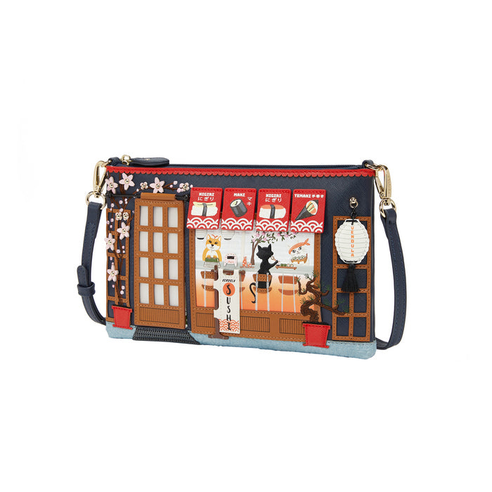 Handbag with a design of a store front and cat, on a white background