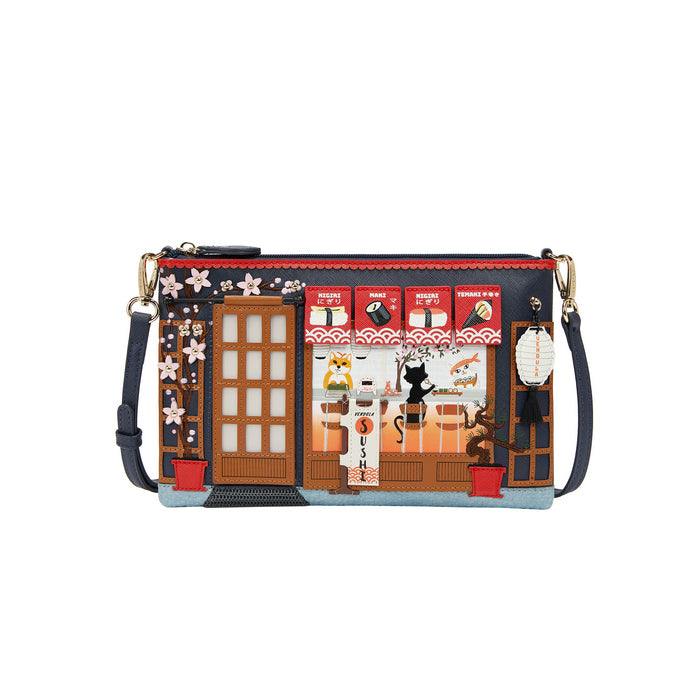 Wristlet with a design of a Japanese street scene on a white background