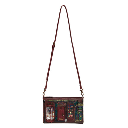 Crossbody bag with a detailed design on a white background