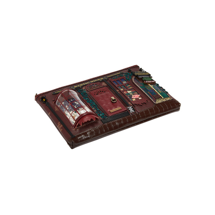 Decorative leather wallet with intricate designs on a white background