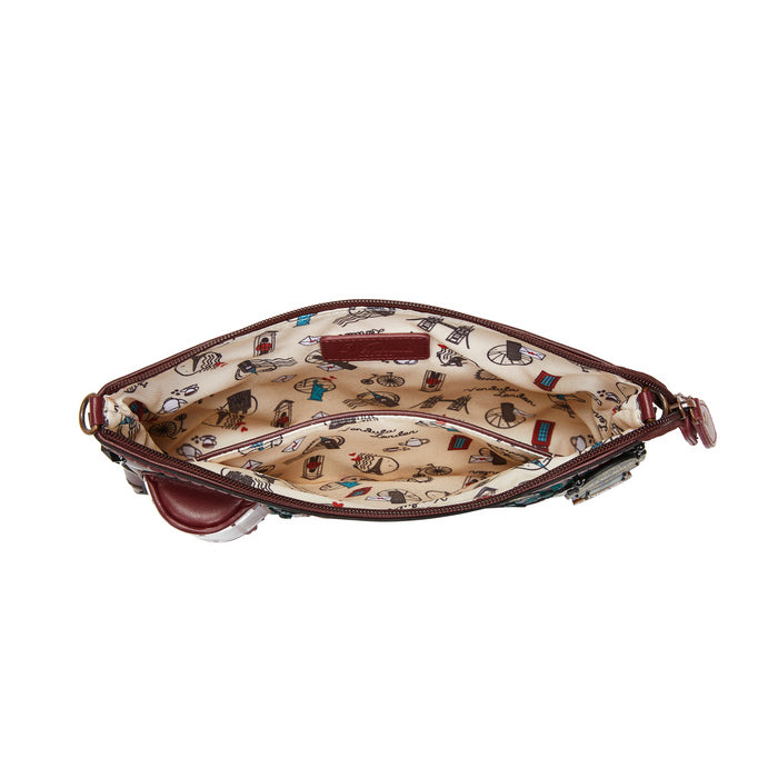 Handbag with patterned interior on a white background