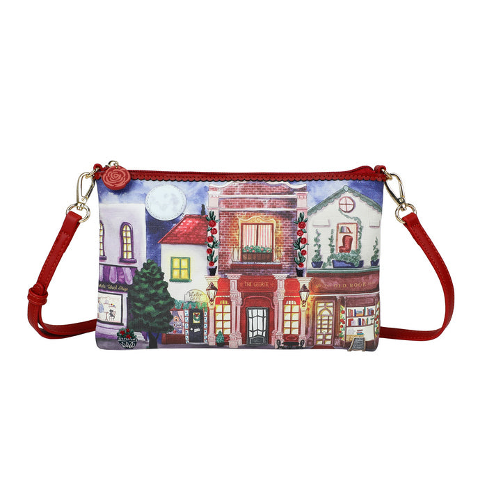 Crossbody bag with a colorful design of buildings on a white background