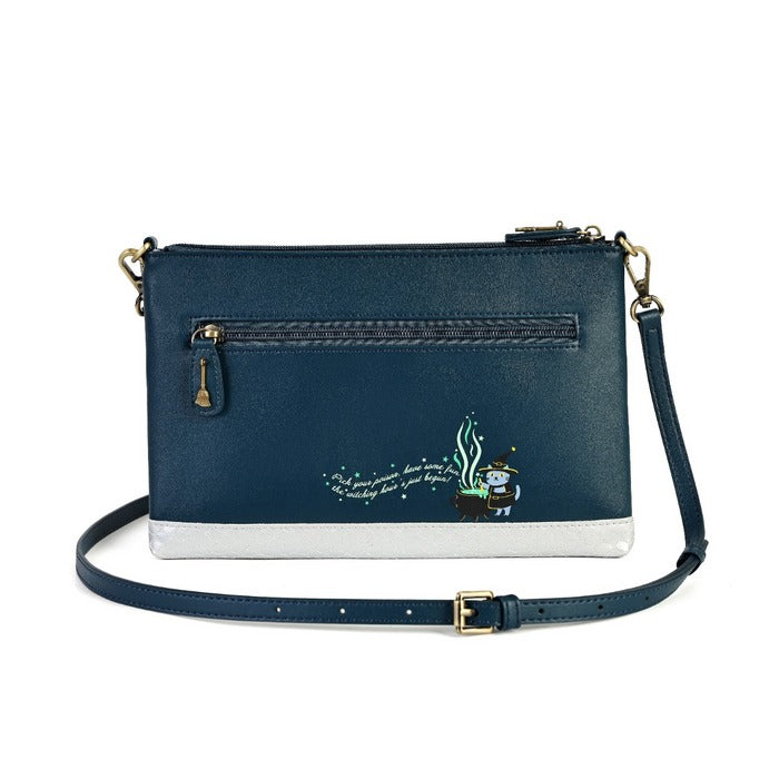 A navy blue faux-leather crossbody clutch bag with a white bottom panel, gold-tone hardware, and a small cartoon snowman graphic with the text 'The snowman says he's coming' on the front pocket.