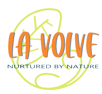 A logo-style graphic with the words 'LA VOLVE' in orange letters outlined in blue, with 'NURTURED BY NATURE' below in dark blue text, overlaid on a pale yellow abstract line drawing on a white background.