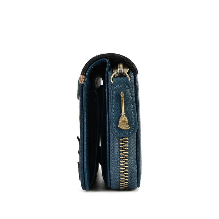 A dark teal blue leather zip-around wallet shown from the side profile, featuring a gold-tone zipper and a decorative gold pull tab shaped like a broom.