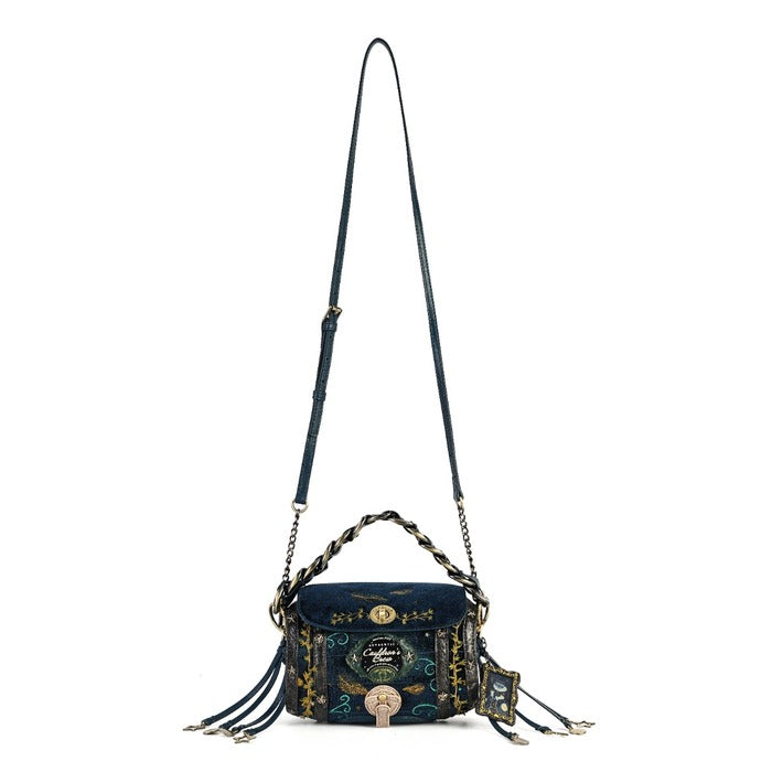 A dark blue embroidered crossbody bag with a long shoulder strap, braided chain handle, and decorative tassels, shown against a plain white background.