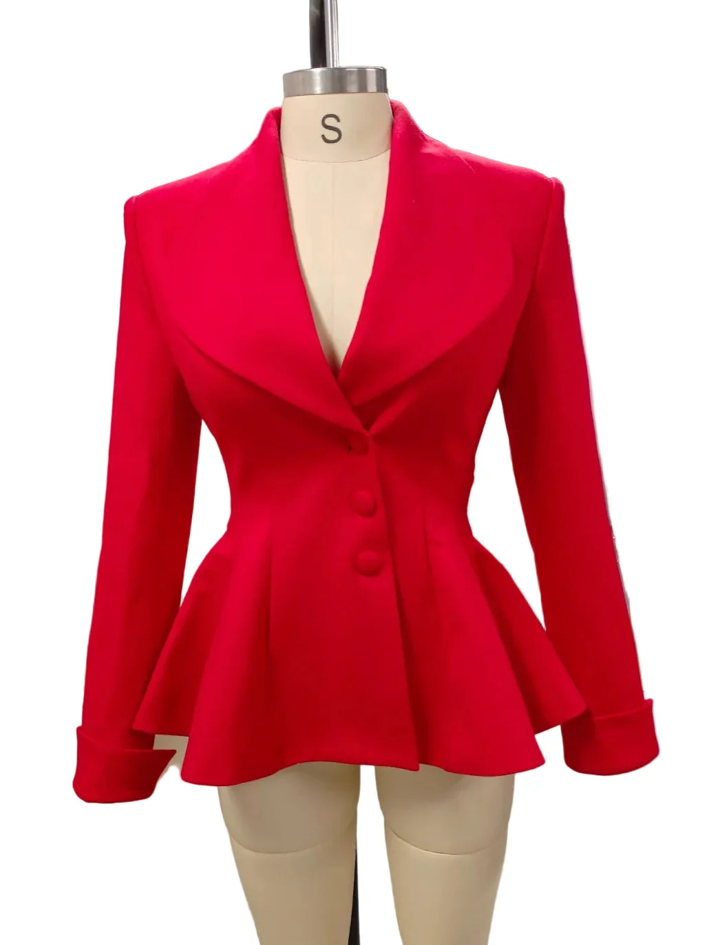 A bright red women's blazer with a notched lapel, three front buttons, and a peplum waist, displayed on a beige mannequin torso against a white background.