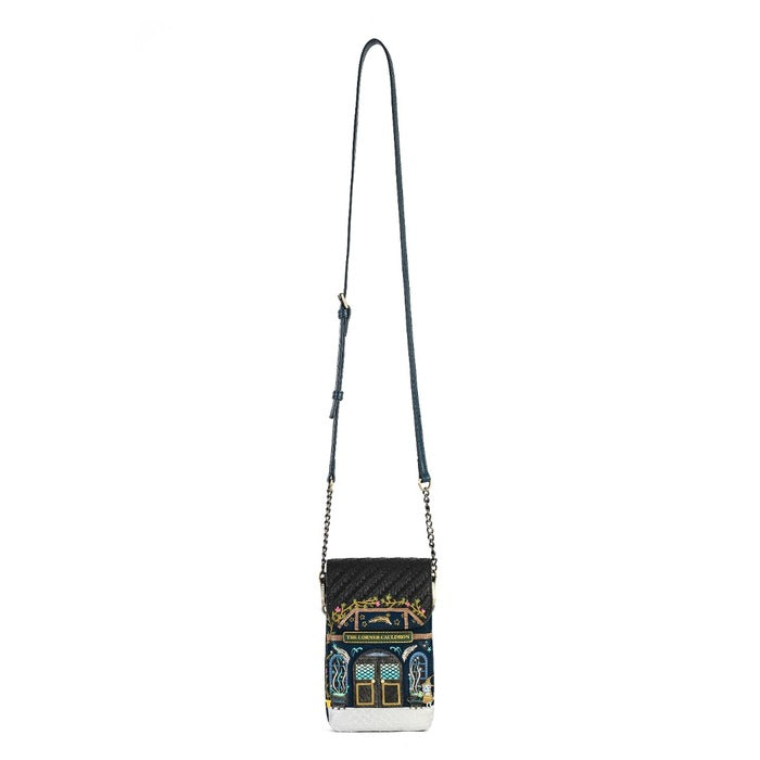 A black quilted crossbody bag with a long dark strap and a detailed architectural illustration on the front pocket, set against a plain white background.