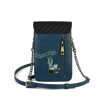 A dark blue faux-leather crossbody phone bag with a black textured top flap, gold-tone hardware, and a small cartoon wizard illustration with white script text on the front pocket.
