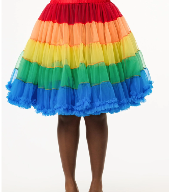 Colorful rainbow skirt with red, orange, yellow, green, and blue layers on a white background.