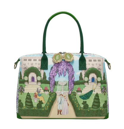 Woman holding a colorful handbag with a fairy tale design against a purple background with flowers.