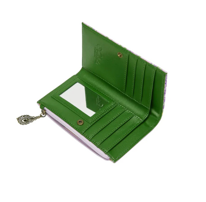 Purple wallet with a green label featuring floral design and text on a white background