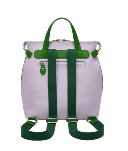 Person wearing a colorful backpack with a garden scene design.