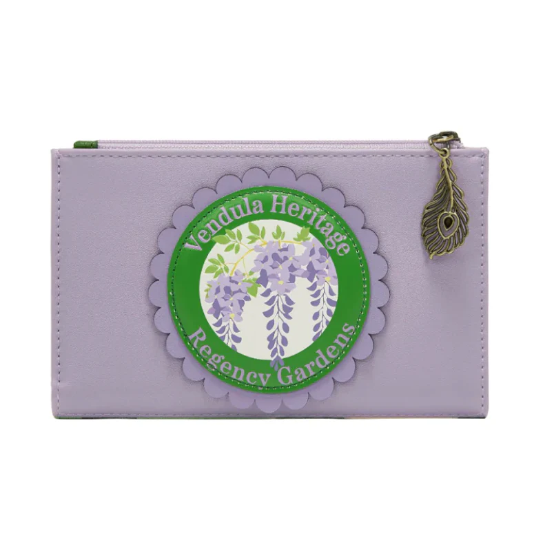 Purple wallet with a green label featuring floral design and text on a white background