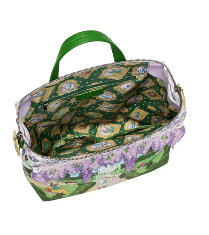  colorful backpack with a garden scene design.