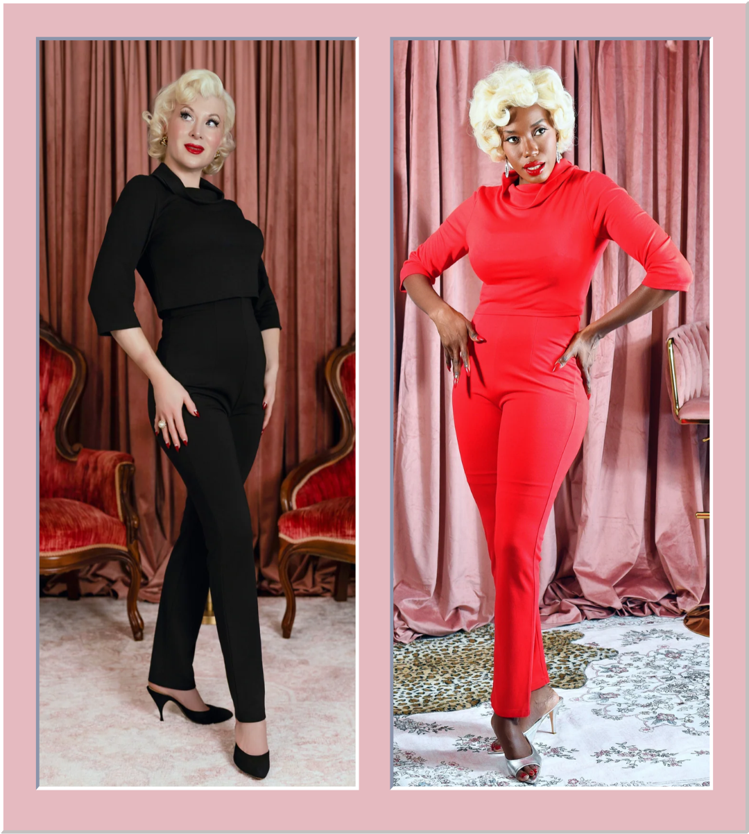 A side-by-side comparison of a model posing in two different color variations of a one-piece jumpsuit. The left panel shows the model wearing a black version, and the right panel shows her wearing a bright red version, both set against a pink curtain backdrop with vintage red chairs.