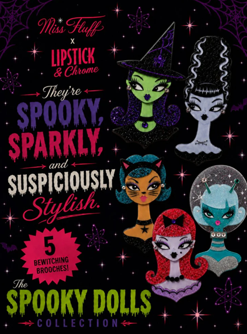 A Monster High themed enamel pin featuring the character Angelina, with glittery pink hair, a black bow, and a purple gothic dress on a white background.