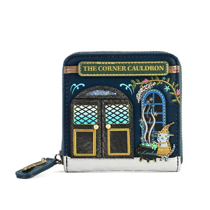 A small zip-around coin purse with a whimsical 'The Corner Cauldron' design, featuring embroidered doors, a wizard character, and a gold sign, shown on a plain white background.