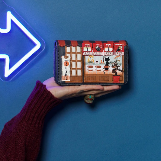 Hand holding a wallet with a unique design against a blue background with a neon arrow.