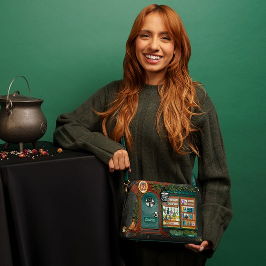 Woman holding a decorative bag with a green background