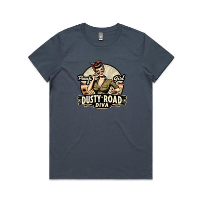 A graphic print on a white background featuring a retro-style pinup illustration of a woman with sunglasses, a red bandana, and an olive green shirt, with the text 'Pinup Girl' and 'Dusty Road Diva'.