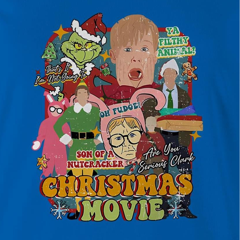 A blue graphic t-shirt featuring a colorful collage of characters and text from the movie 'The Grinch' parody titled 'Christmas Movie'.