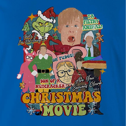 A blue graphic t-shirt featuring a colorful collage of characters and text from the movie 'The Grinch' parody titled 'Christmas Movie'.
