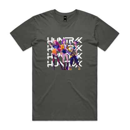 graphic t-shirt featuring three stylized female anime characters standing in front of a large white repeating 'HUNTRX' logo. The shirt fabric is visible, and the graphic is printed in vibrant shades of purple, yellow, orange, and black.