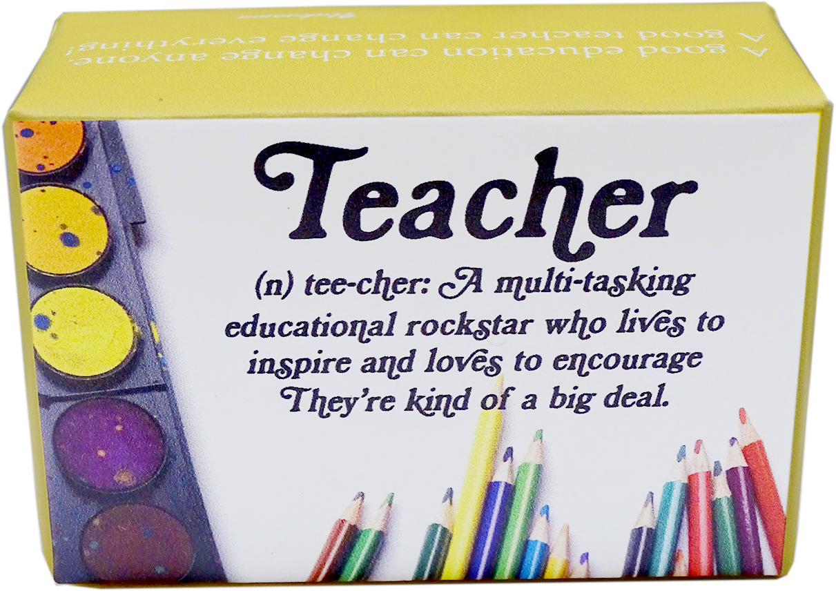 A boxed novelty tee-shirt product with a yellow top and side panels, a white front panel, and printed text reading 'Teacher (n) tee-cher: A multi-tasking educational rockstar who lives to inspire and loves to encourage. They're kind of a big deal.