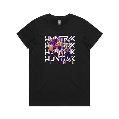 A close-up of a black t-shirt featuring a graphic print of three stylized female characters in colorful outfits, overlaid with the word 'HUNTER' repeated vertically in bold white letters.